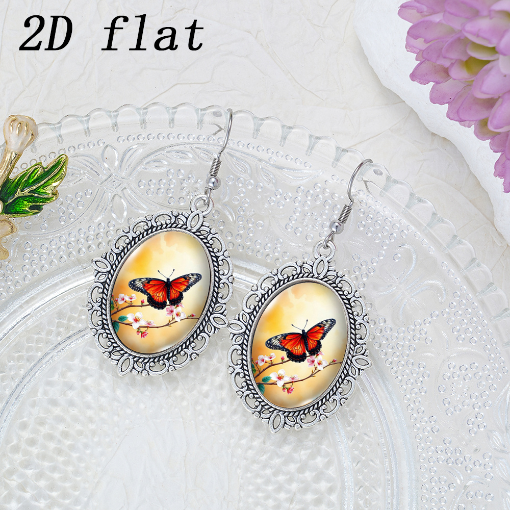 Warm Orange Glow Butterfly Flower Branch Pattern Glass Earrings